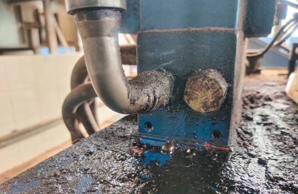 oil from a leaking Imminent Threaded Fitting Failure