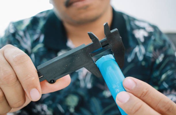 caliper Measuring a hydraulic hose